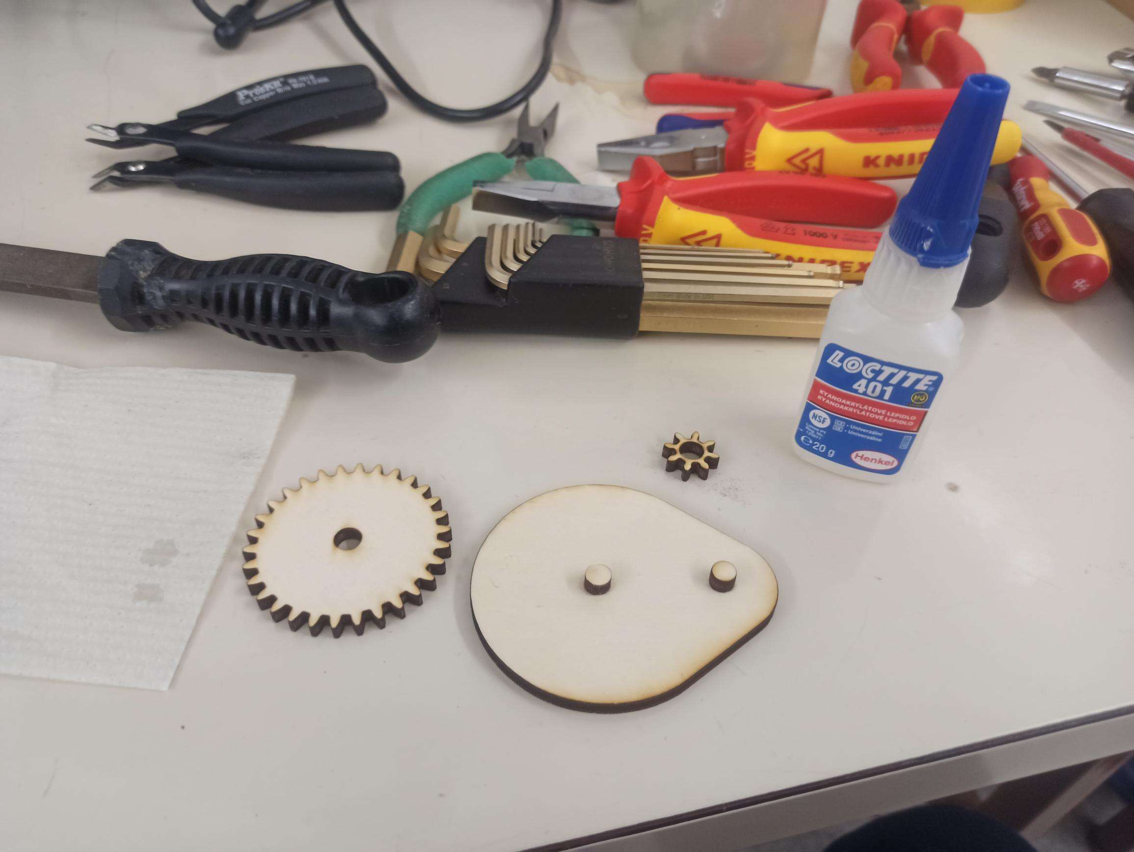 Placing gears onto the holder for assembly